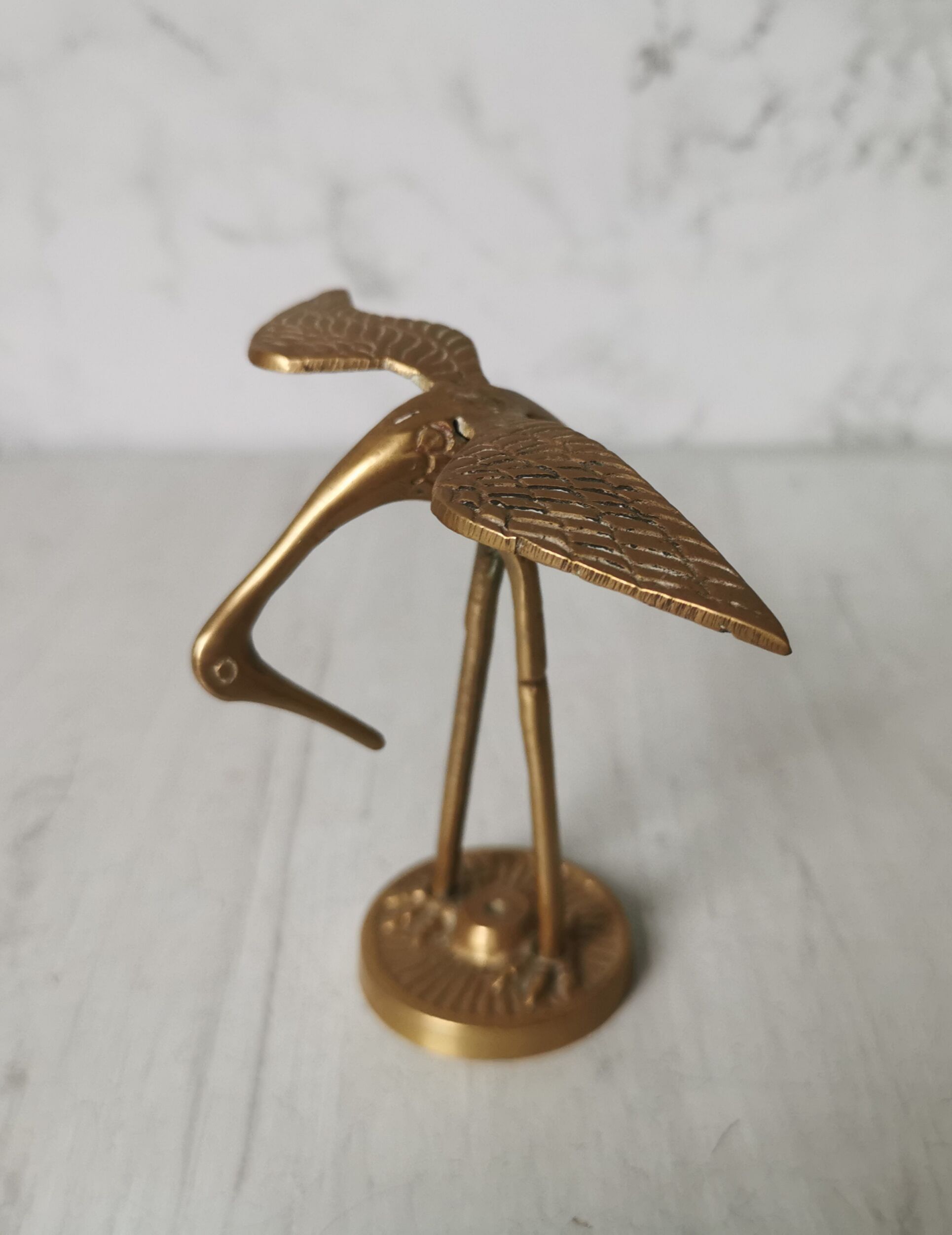 Brass heron