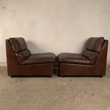 A pair of leather armchairs, Switzerland, 1970s