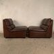 A pair of leather armchairs, Switzerland, 1970s