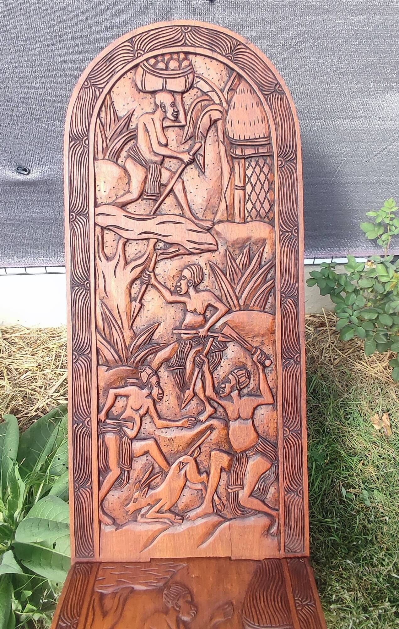 Old African wooden carved talking chair.