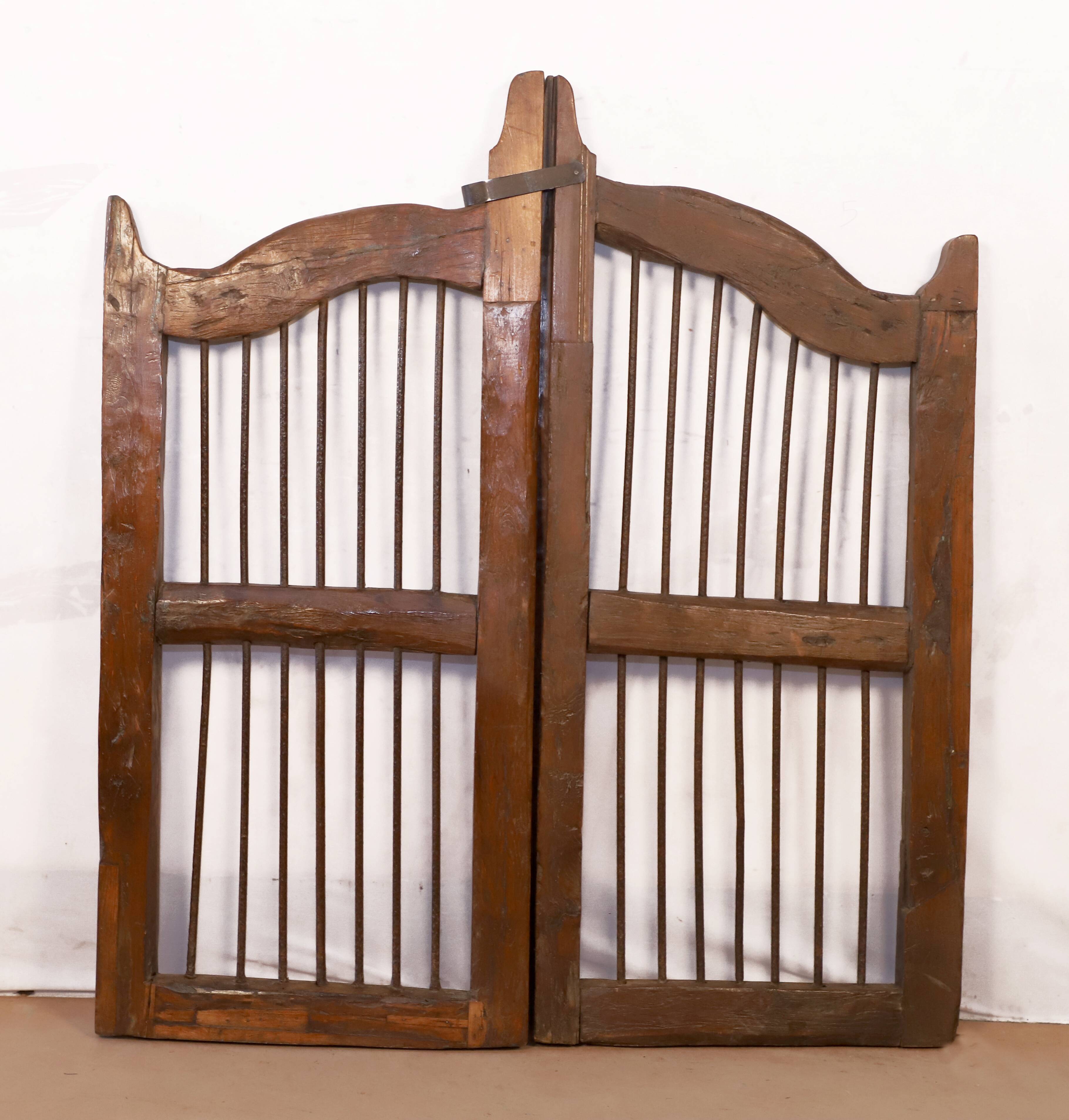 Old Burmese teak gate with openwork wrought iron panels