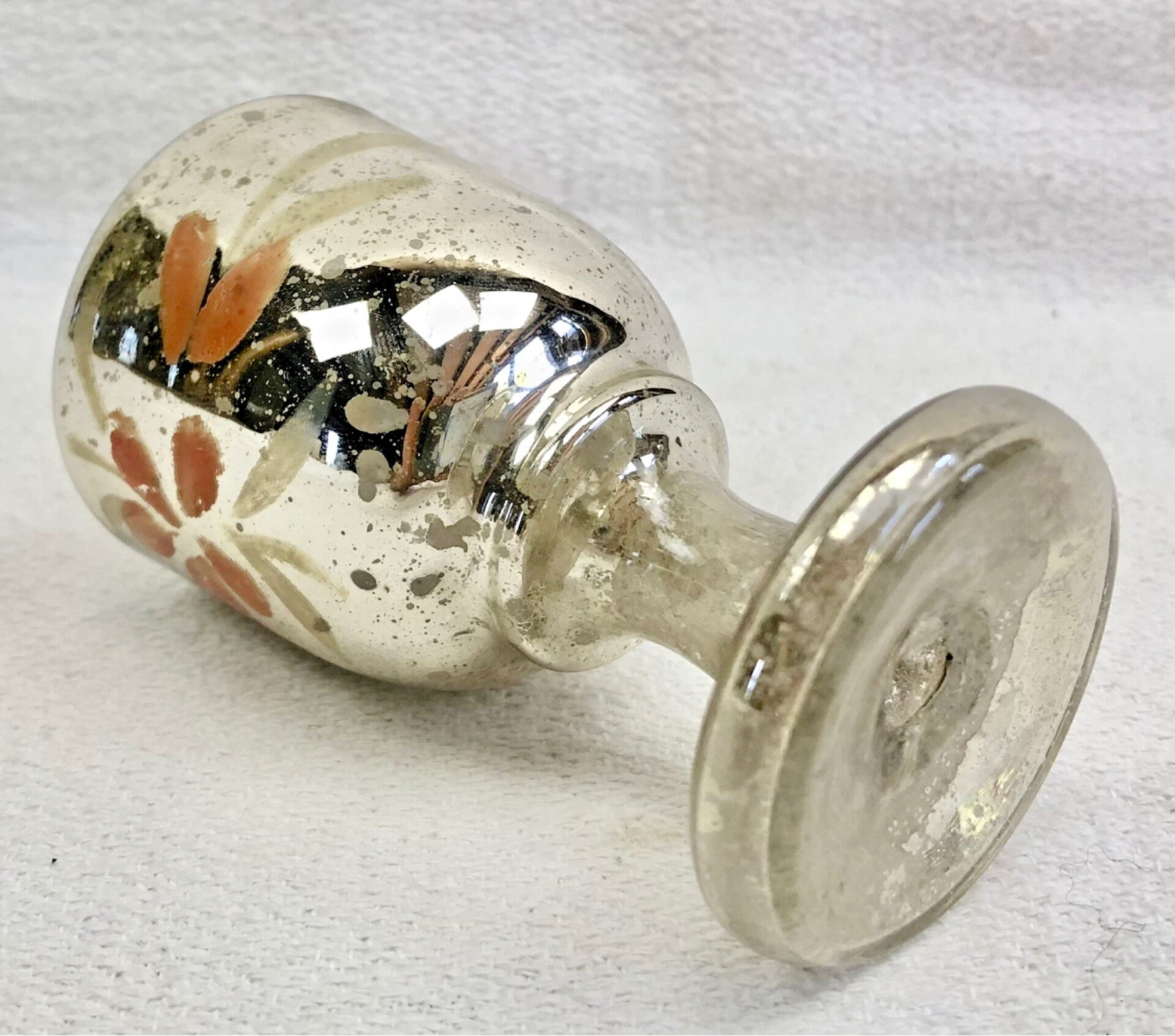 Painted blown glass egg cup with mercury gilding, 19th century.