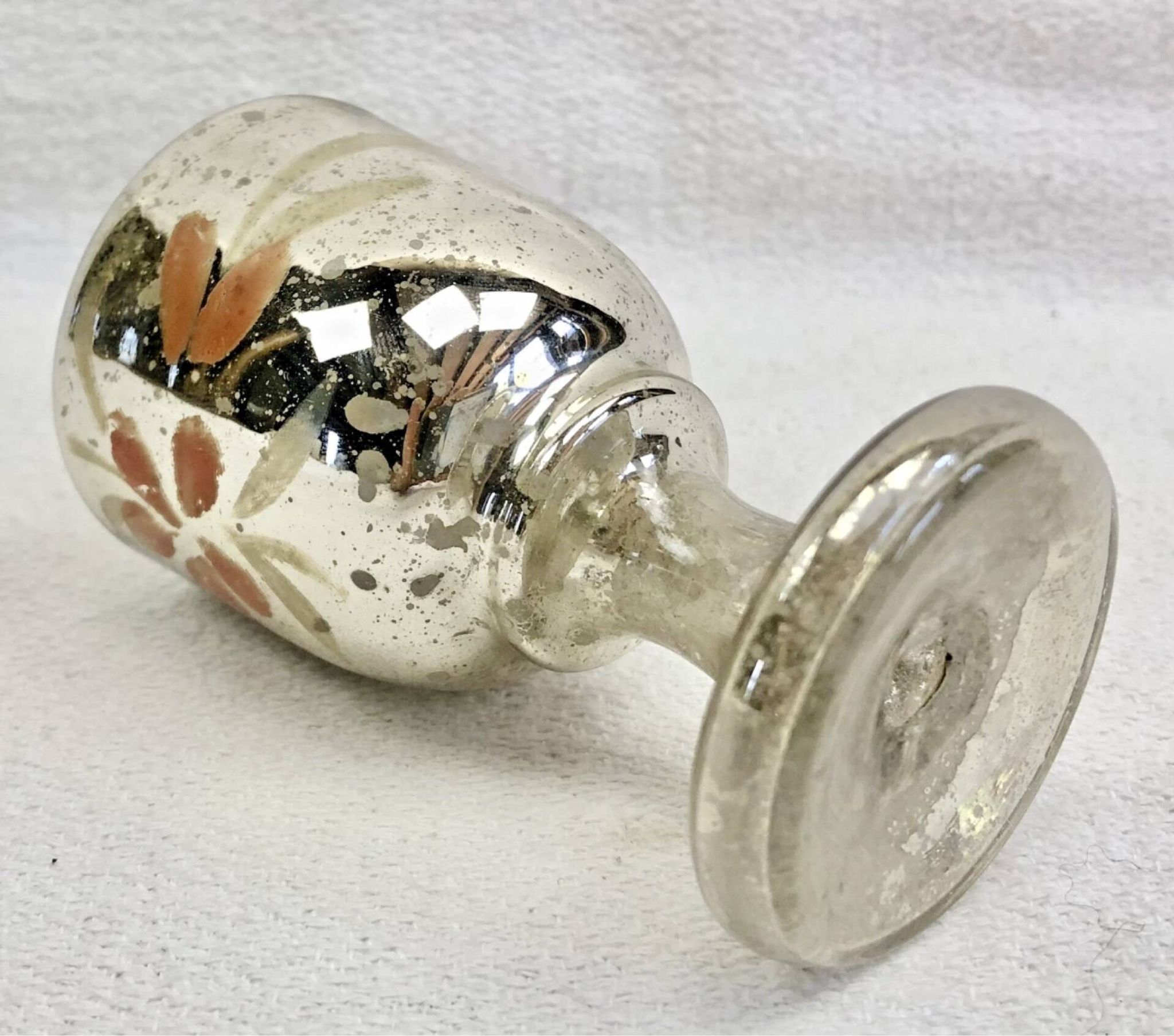 Painted blown glass egg cup with mercury gilding, 19th century.