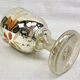 Painted blown glass egg cup with mercury gilding, 19th century.