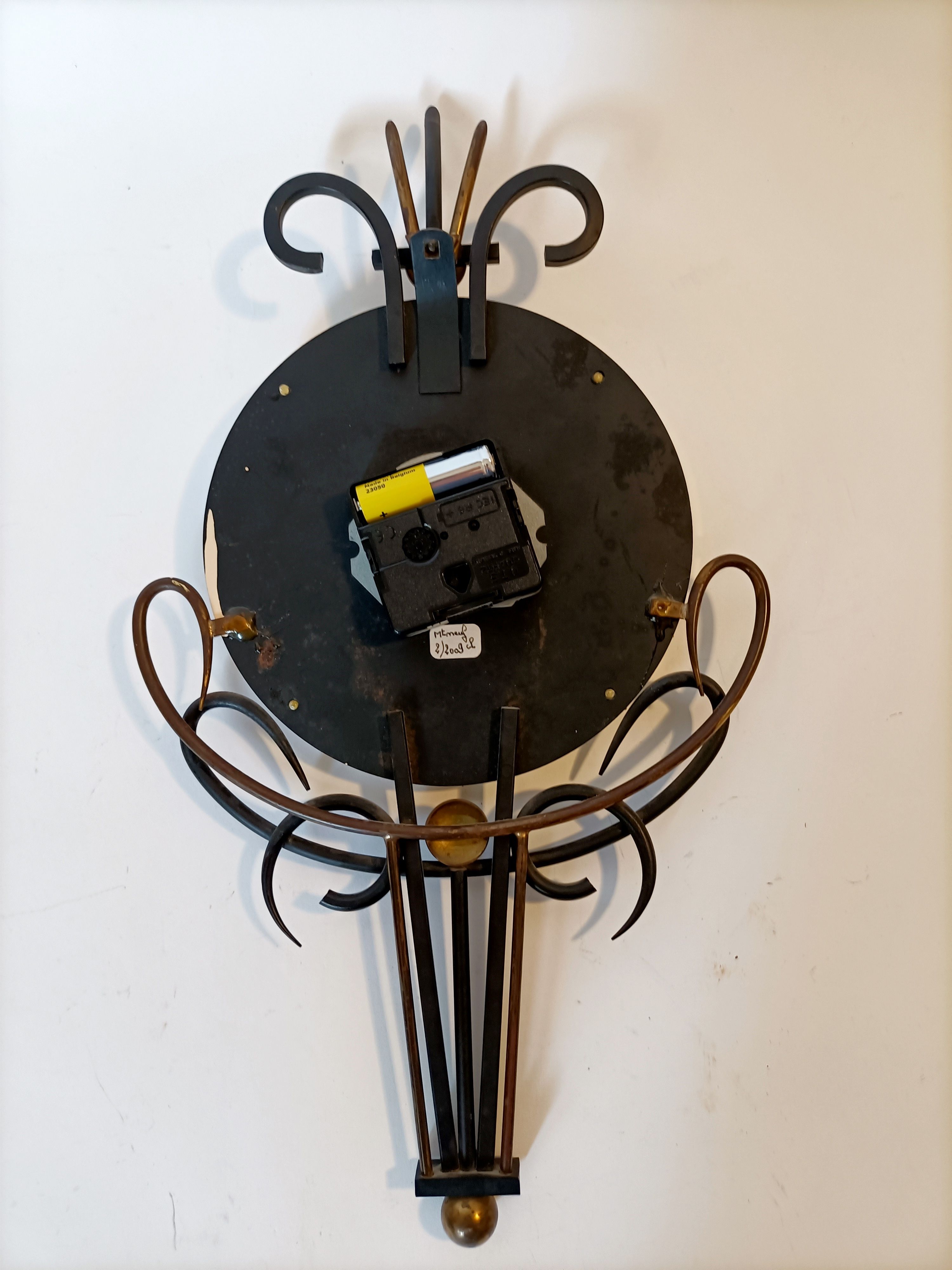 Jaz clock in black metal and golden brass, model Cabic 1967/1968