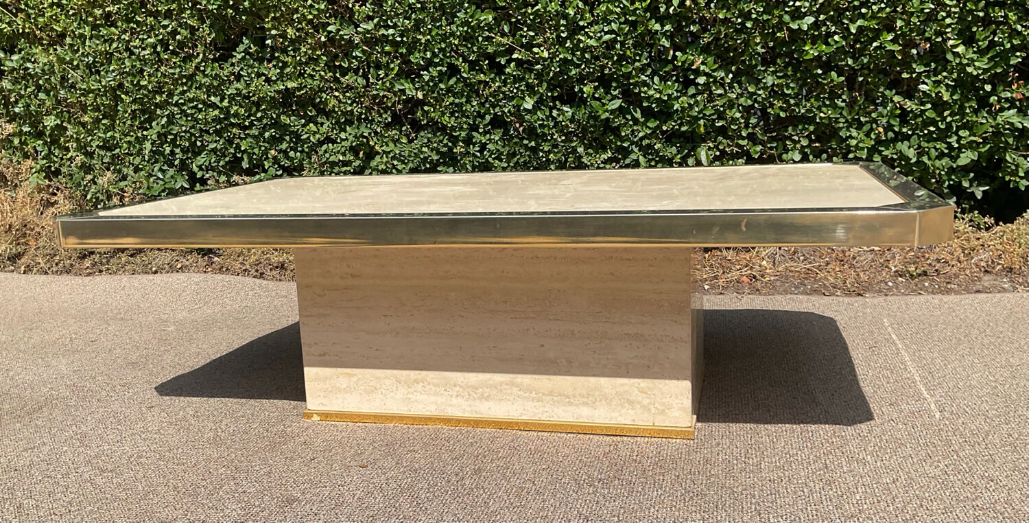 Vintage coffee table in travertine and brass.