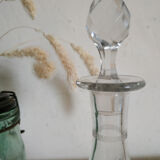 Old wine carafe in glass worked