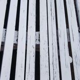 Cast iron and wooden slat garden bench from the early 20th century