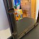 Patinated black rectangular wooden mirror