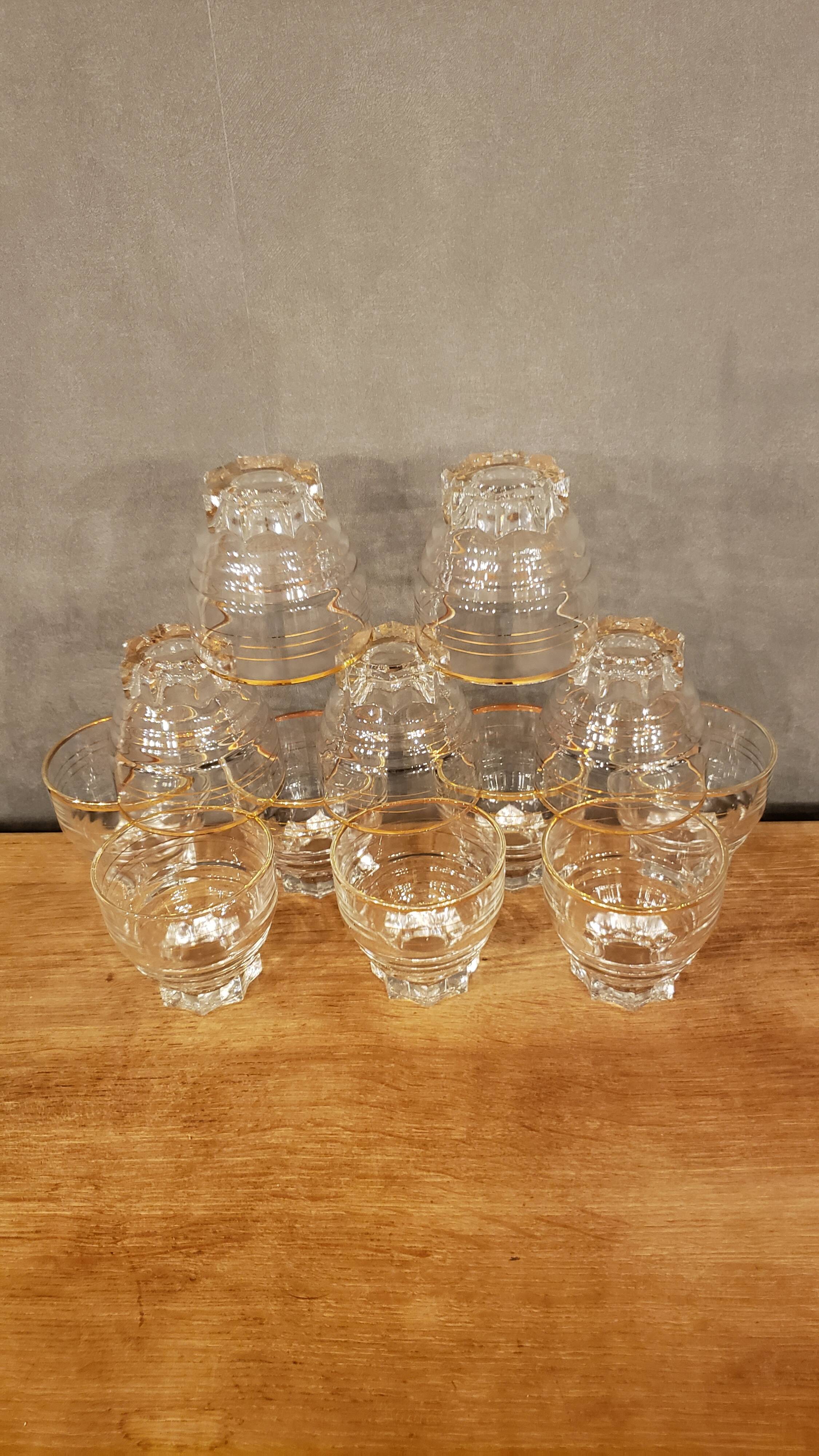 12 vintage glasses with star base and gold edging