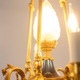 Louis XVI style chandelier in gilded bronze. Circa 1900.