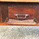 Old farmhouse table with cherry and chestnut panels with 3 drawers.