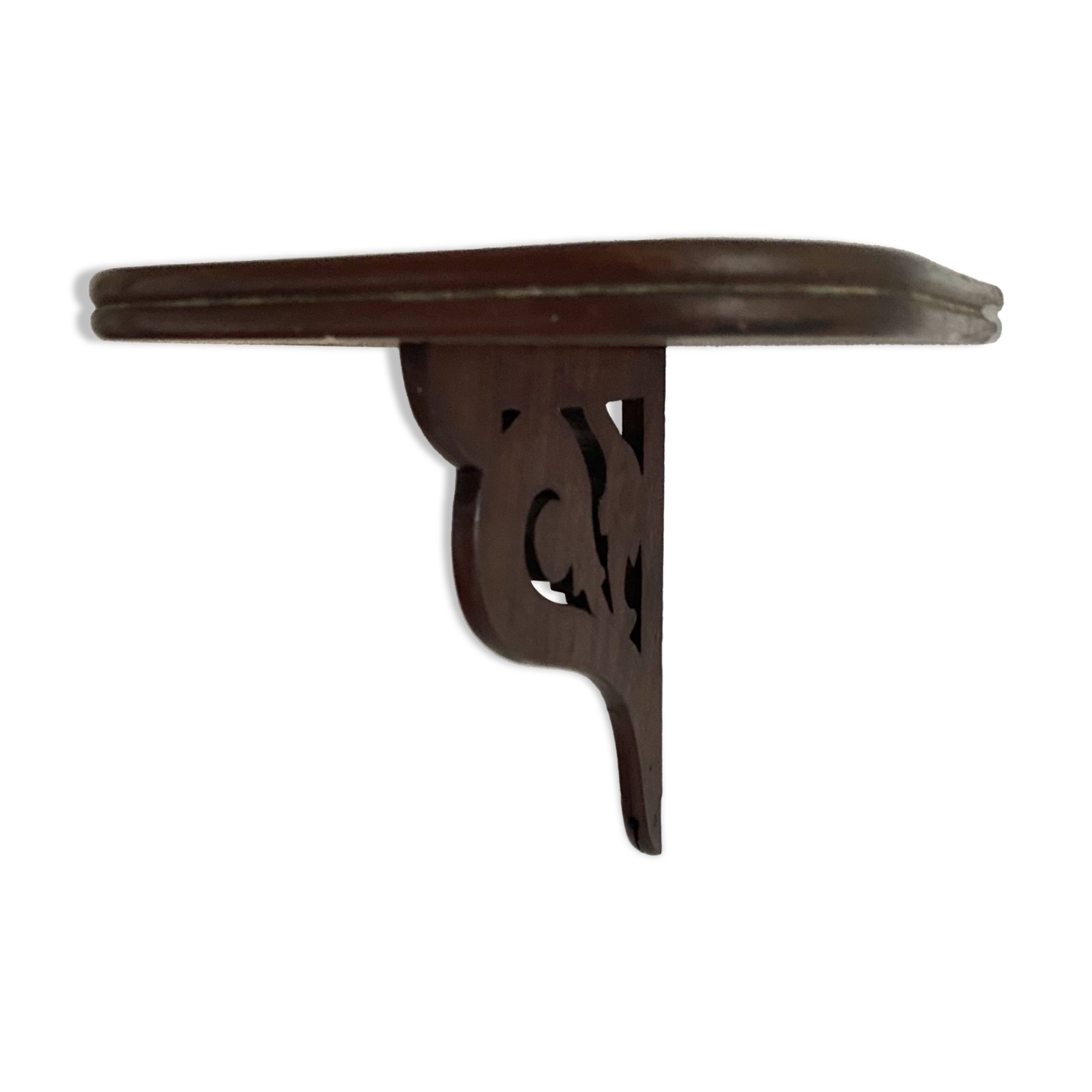 small old openwork wooden wall shelf