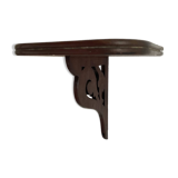 small old openwork wooden wall shelf