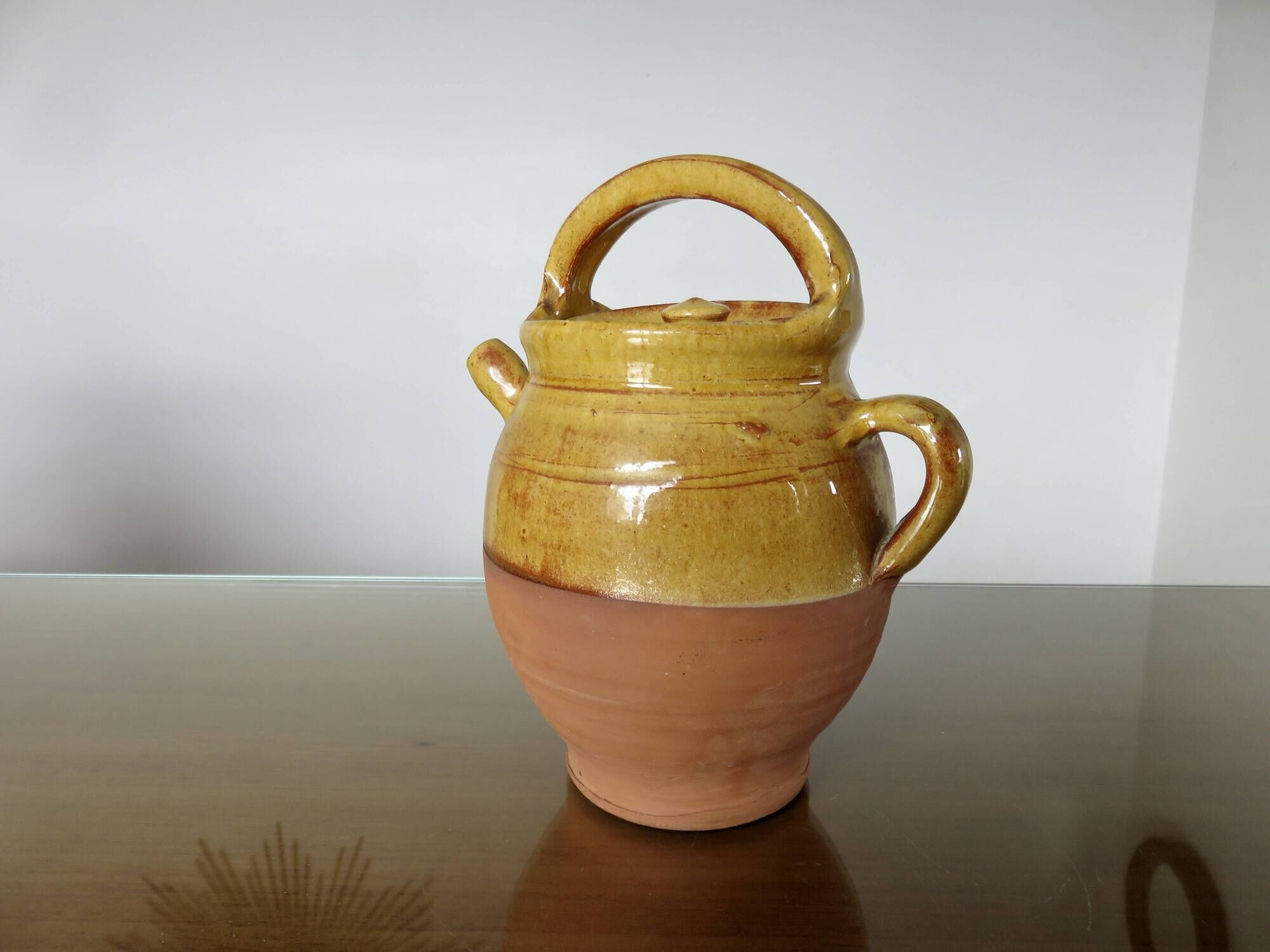Glazed yellow terracotta jug, south-west of France.