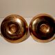 Pair of brass hand candlesticks