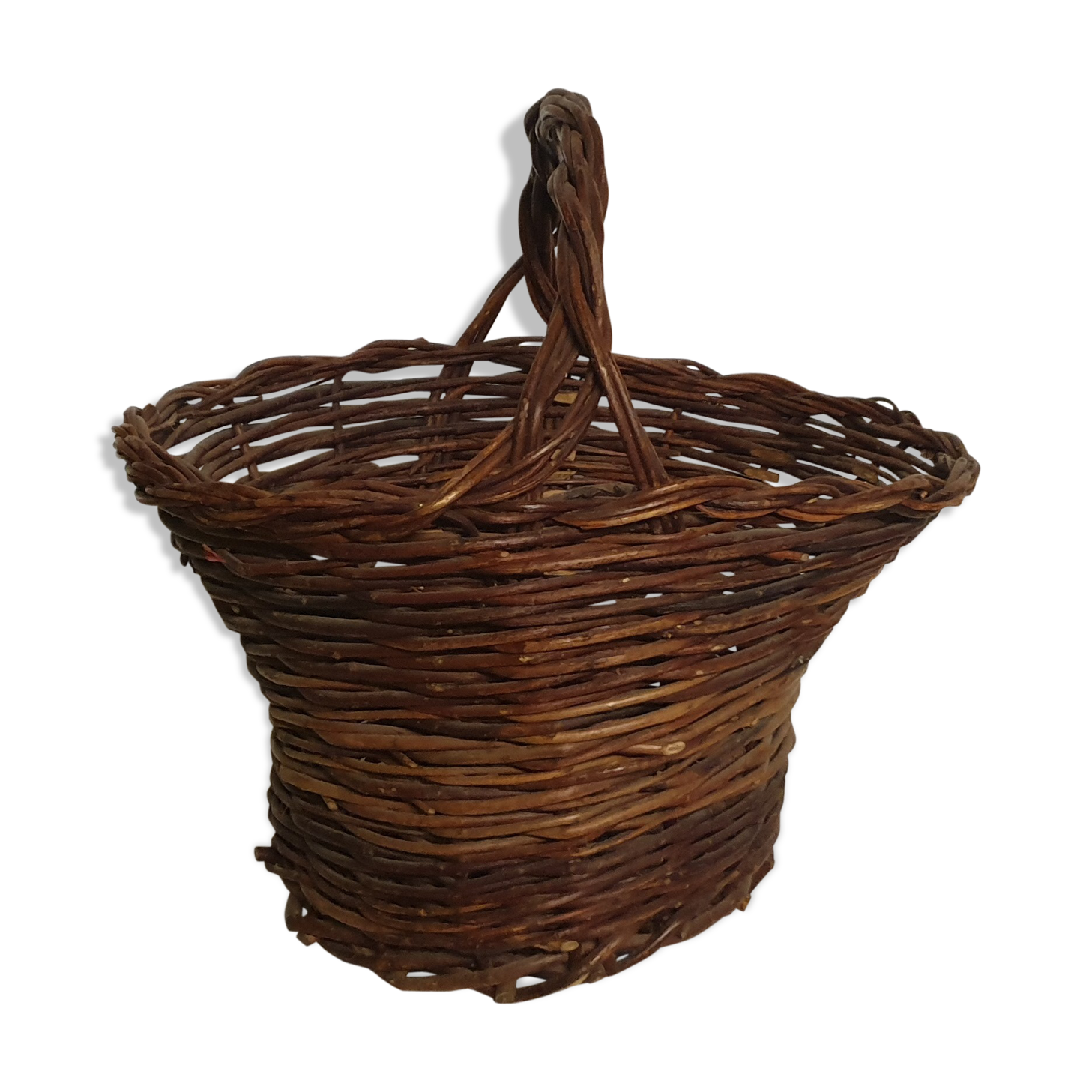 Rustic basket made of raw wicker