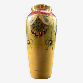 Limoges porcelain vase with Louis XVI style decoration on a gold background signed Buisson