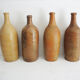 4 old stoneware bottles