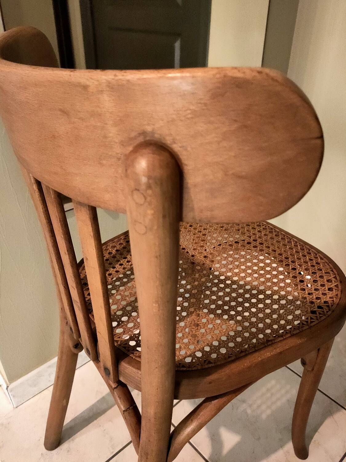 Old bistro chair with caned seat