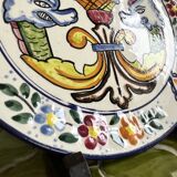 Decorative ceramic plate with griffins