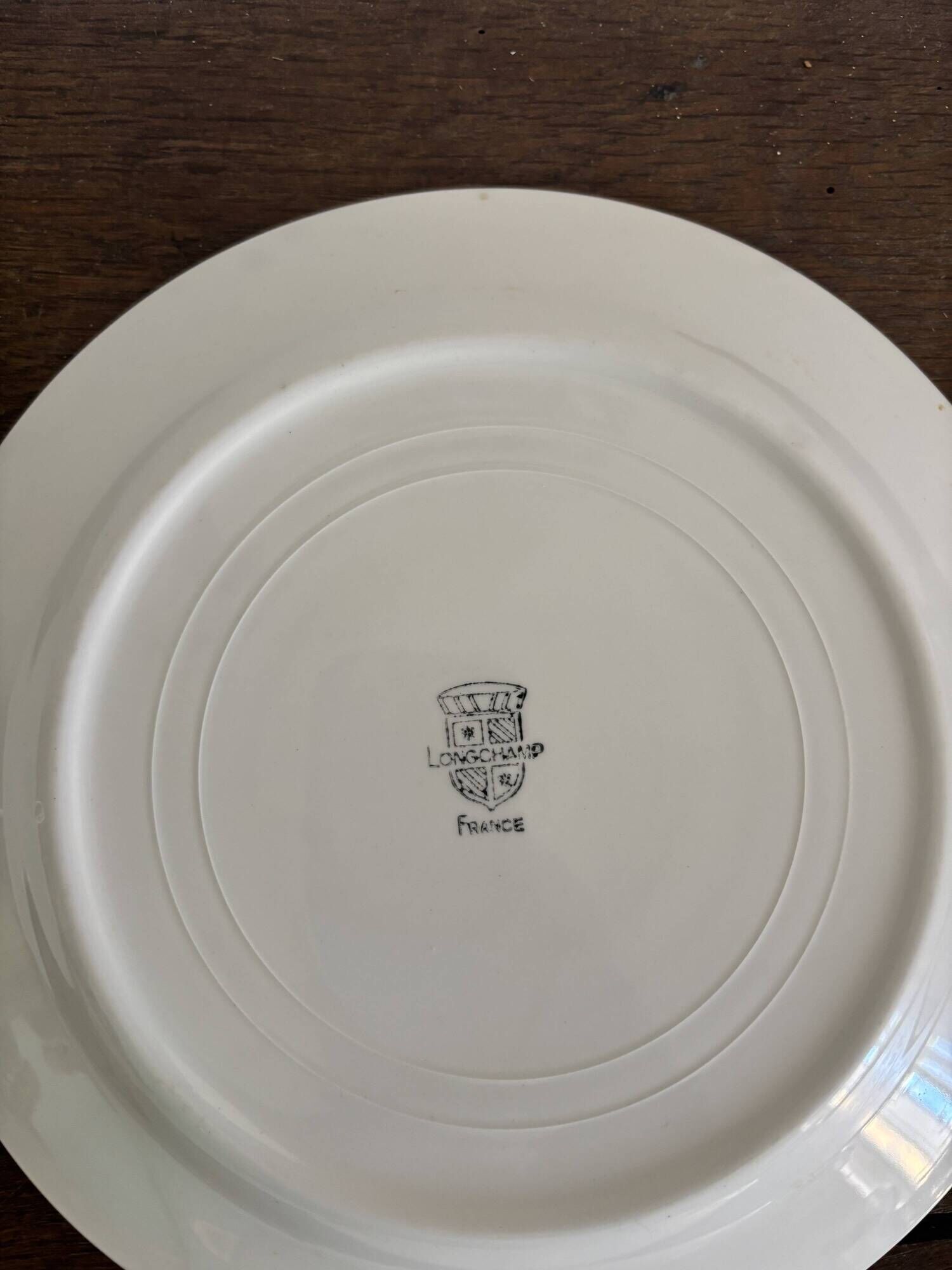 Vintage Longchamp France service – 18 graphic plates from the 1950s.