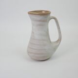 Signed white beige ceramic pitcher