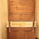 Vintage vanity toilet furniture with marble top.
