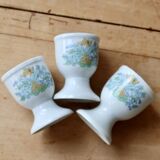 Vintage white porcelain egg cups with floral pattern