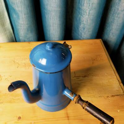 Blue enameled sheet metal chocolate maker