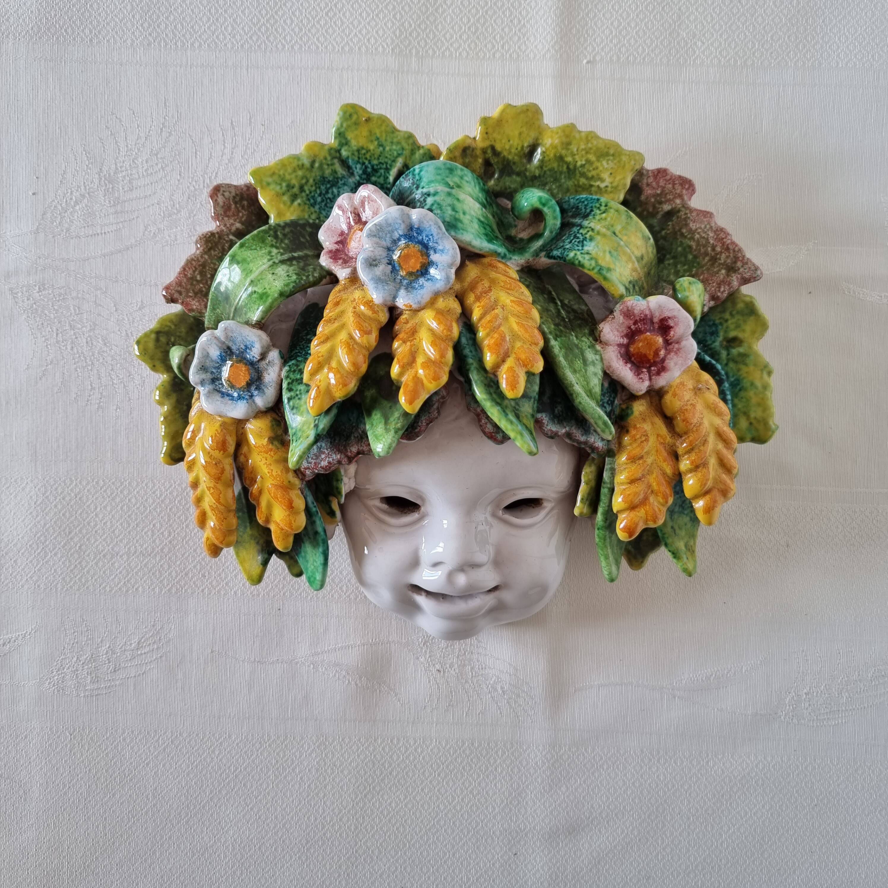 Vintage Italian ceramic wall mask, handmade, decorated with floral details