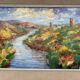 Colorful landscape painting with a river and hills signed Benjam
