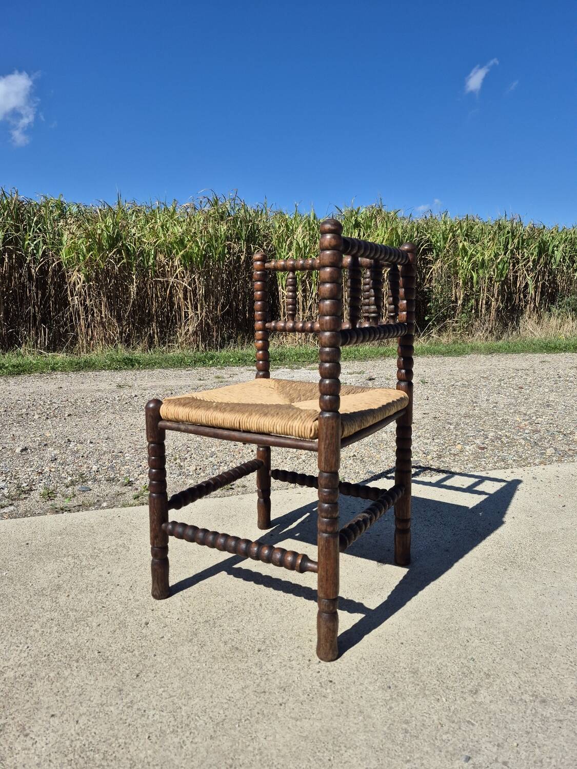 Vintage Dutch rustic corner chair bobbin turned oak with rush seating