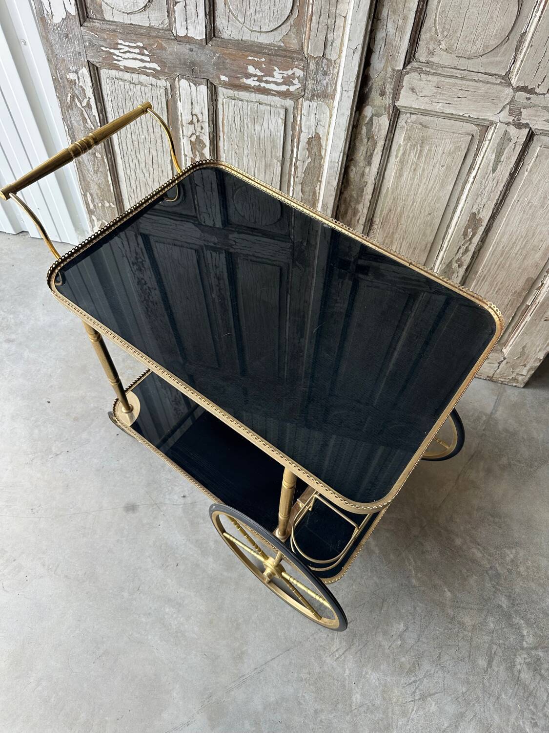 Vintage black and gold rolling trolley