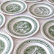 Service of vintage green plates in country English earthenware