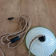 Portable lamp in pale green and white glass