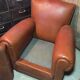 Fauteuil club moustache en cuir marron