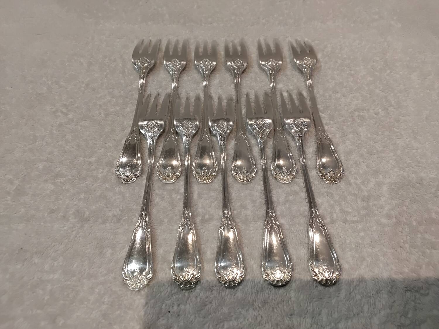 11 silver-plated cake forks, goldsmith SFAM Louis XIV style