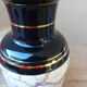 Vintage black and gold vase, vase decorated with grooves, black marble ceramic vase, oriental vase.