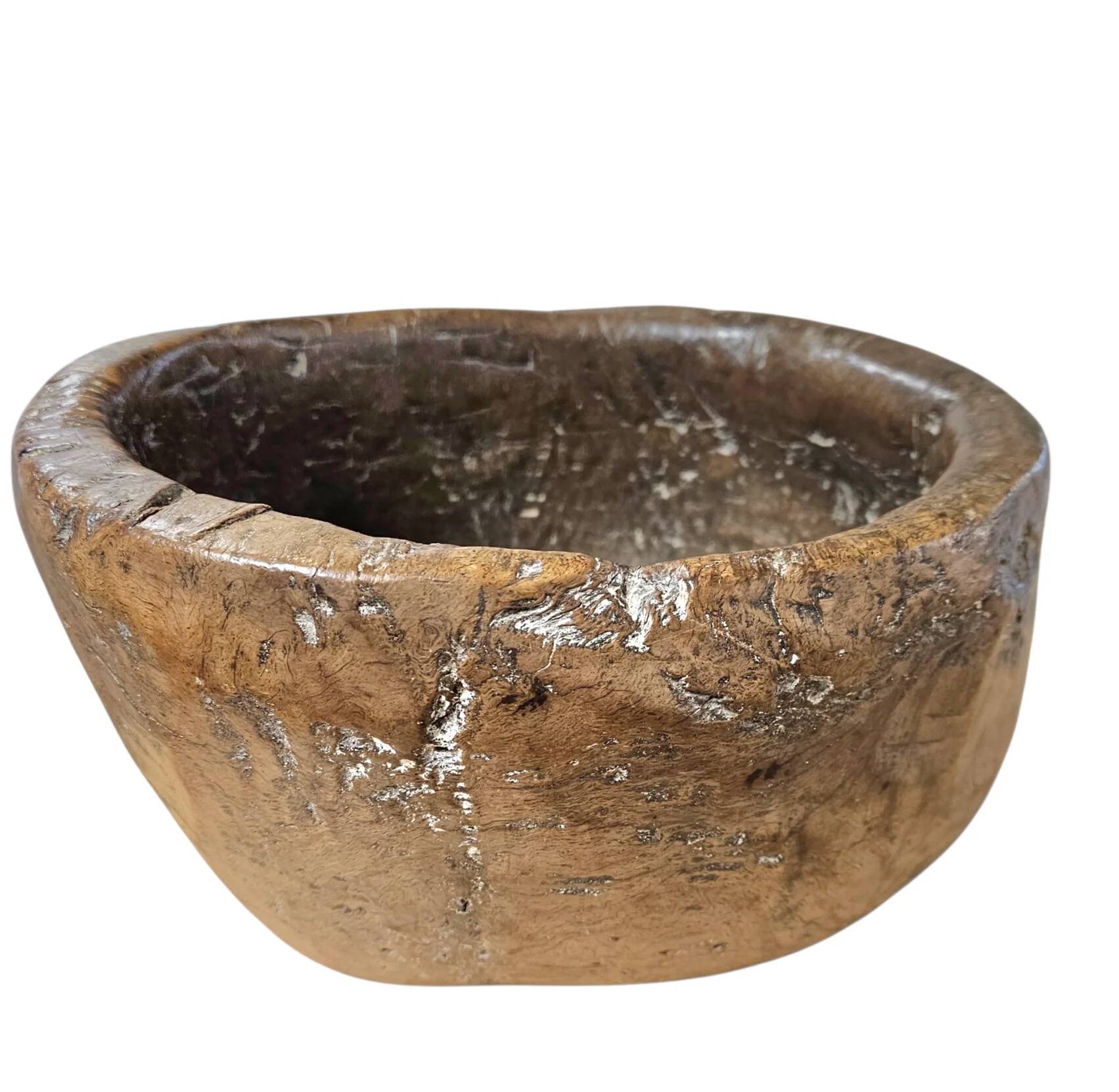 A substantial hand-hewn wooden bowl carved from a single burl section
