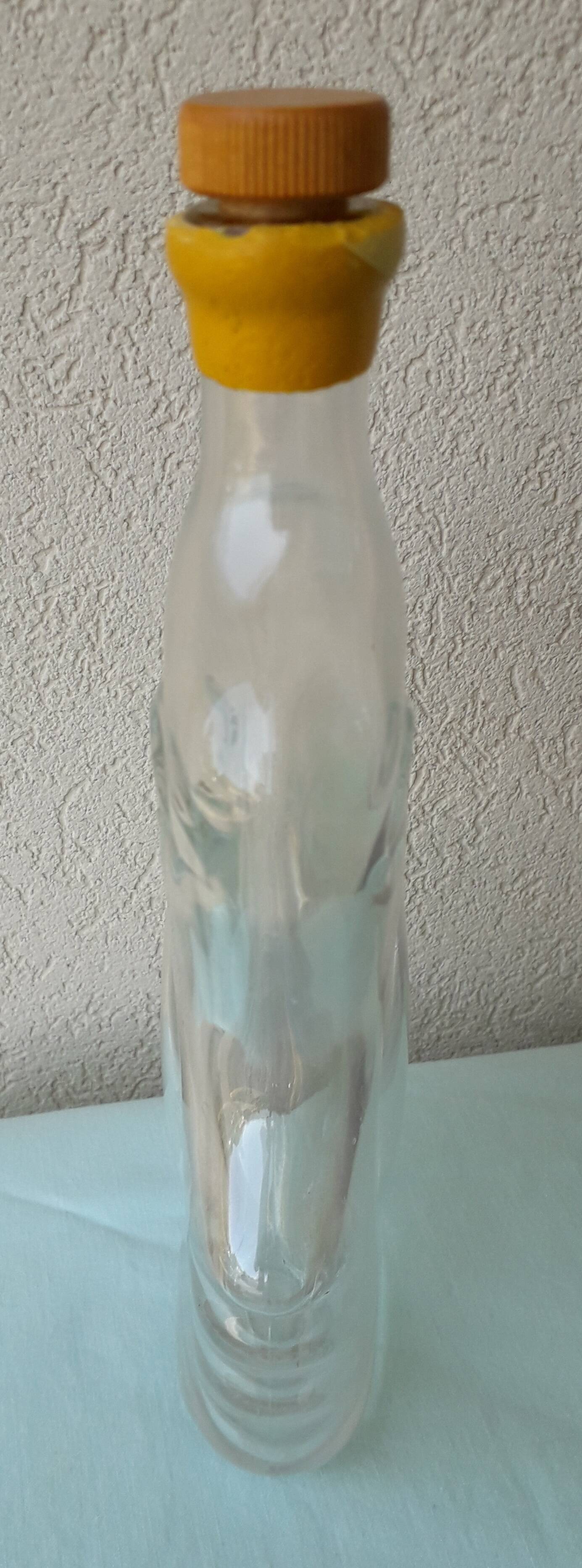 Bouteille anthropomorphe en verre