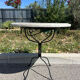Round marble table with marble inlay