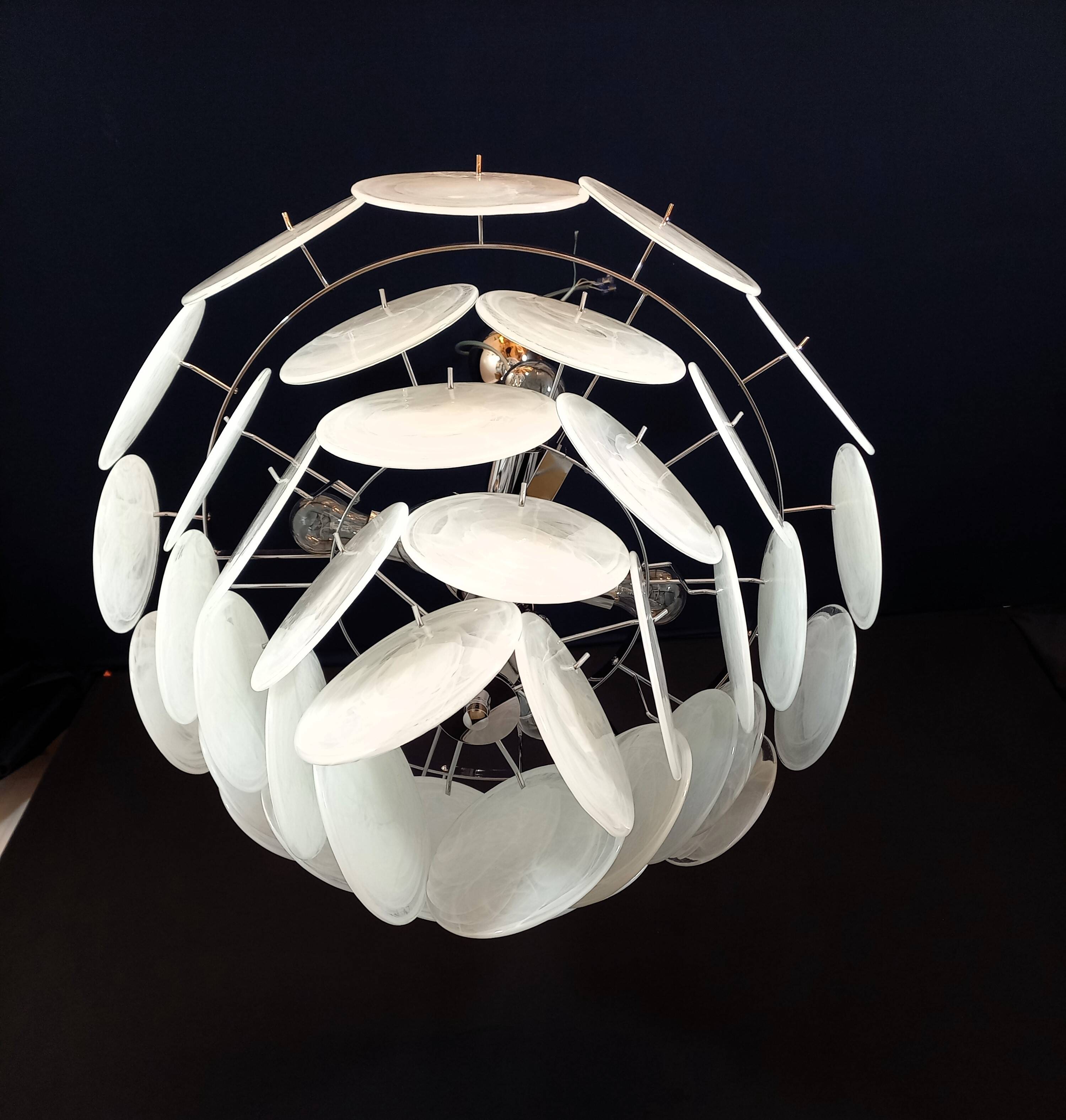 Handcrafted chandelier with Murano glass and handmade alabaster discs.