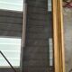 Gilded mirror on wood, 89x59