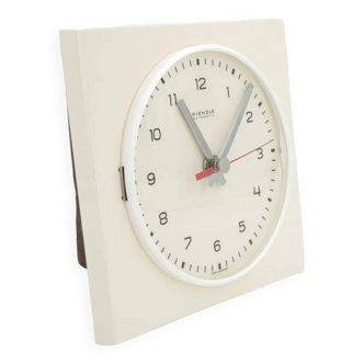 Wall clock from the 60s in off-white ceramic and Diehl brand