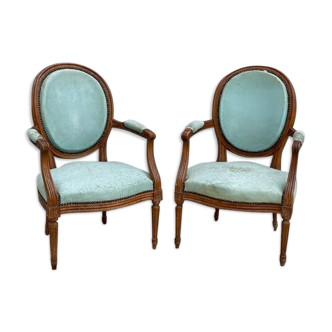 Pair of Louis XVI style convertible armchairs