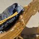 2 wooden footrests with blue cushions