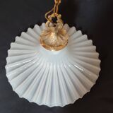 Round pendant light in pleated semi-opaque glass