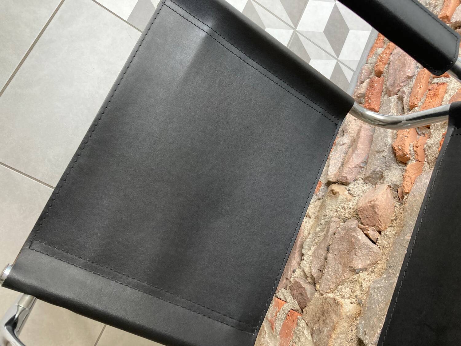 Chrome and black leather armchair type B34