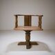 Swivel armchair in carved oak with ball bearings, early 20th century.